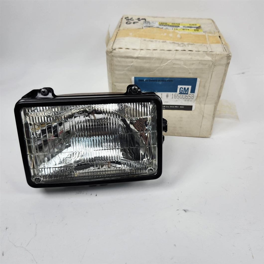 82-89 Chevy Camaro IROC-Z LT RS Z28 LH Black Outer Headlight 16500658 NOS