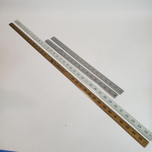 Vintage Lot of 4 Metal Rolled Rulers with Advertising